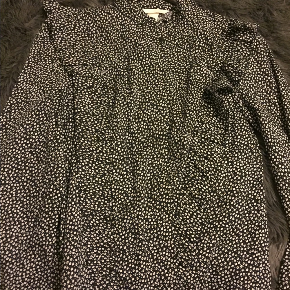Black floral button up with ruffles.